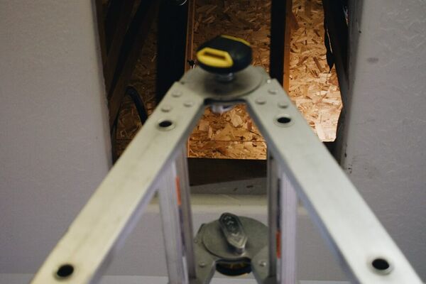 Close-up of a Five Star technician brazing copper refrigerant lines during an AC repair in St. George, Utah