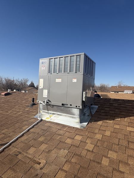 New AC Pro rooftop package unit installed on a Southern Utah home