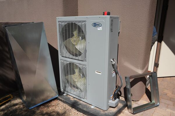 Five Star HVAC team servicing a furnace and air handler in St. George, Utah